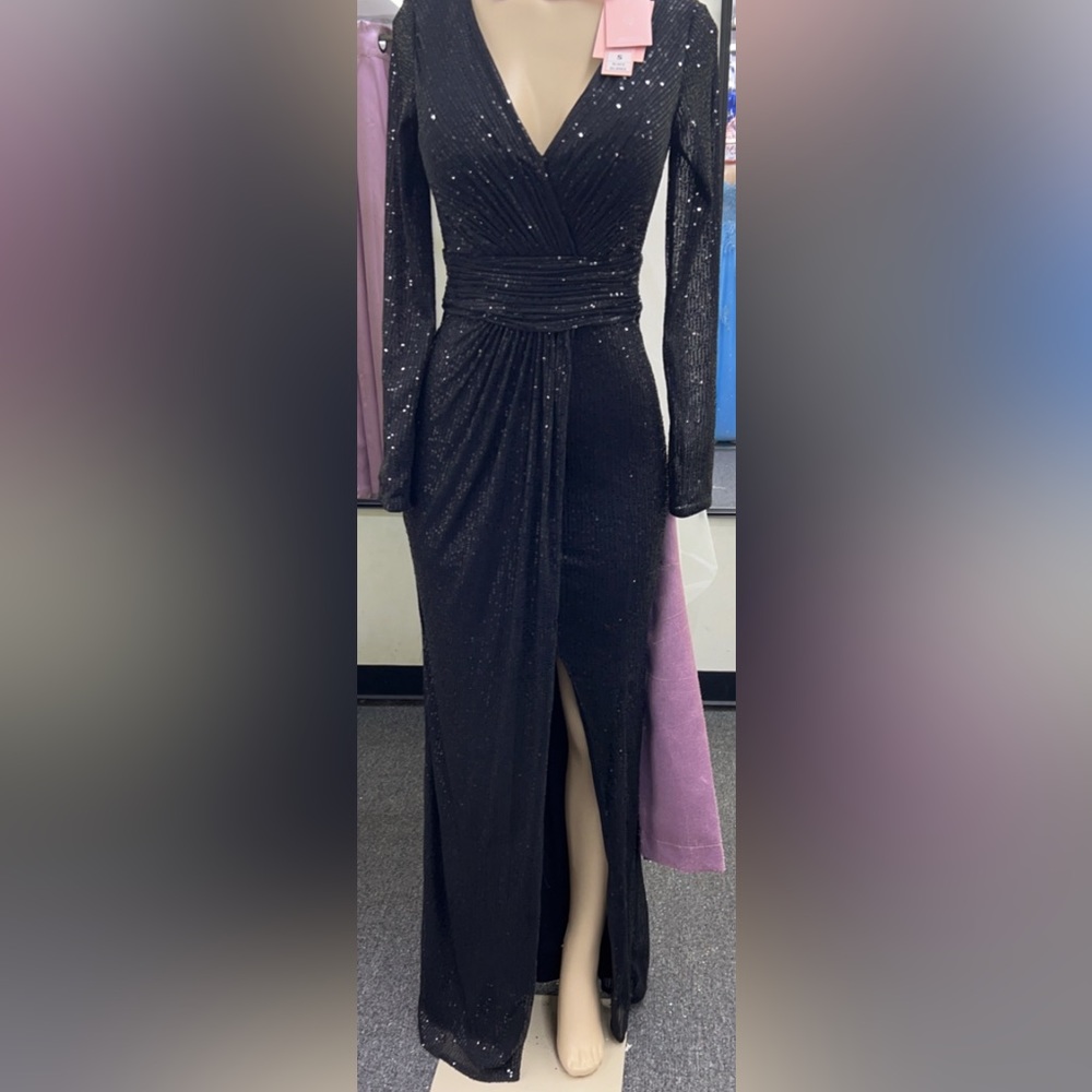 Beautiful black wrap sequin dress with split.Only whore it once.Very comfortable